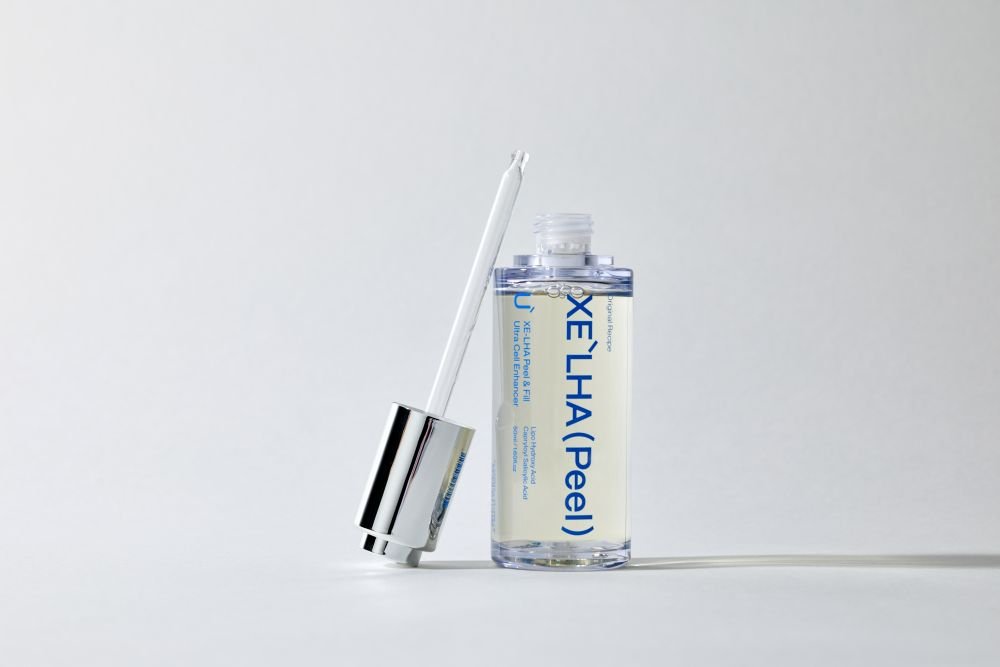 XE'LHA Peel with dropper on a light surface