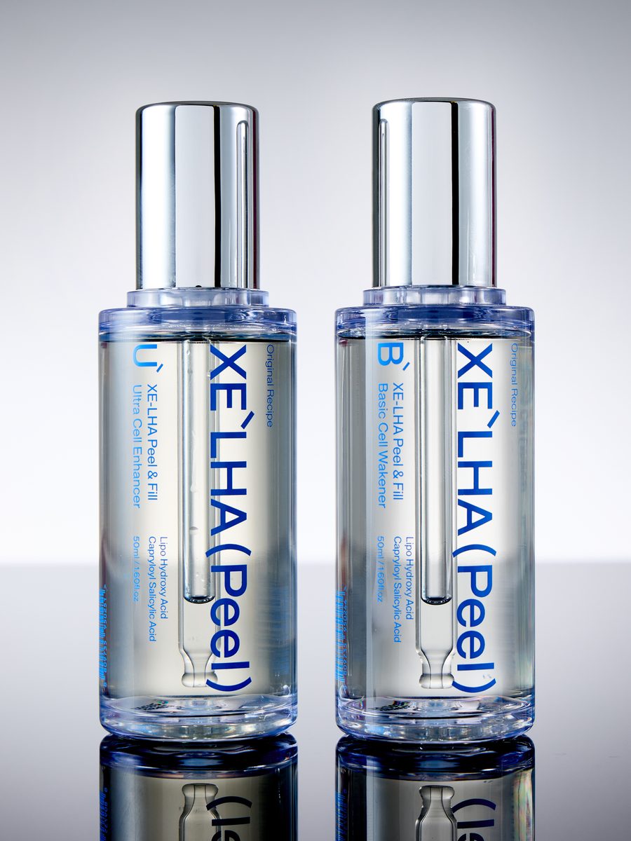 Two XE'LHA Peel bottles